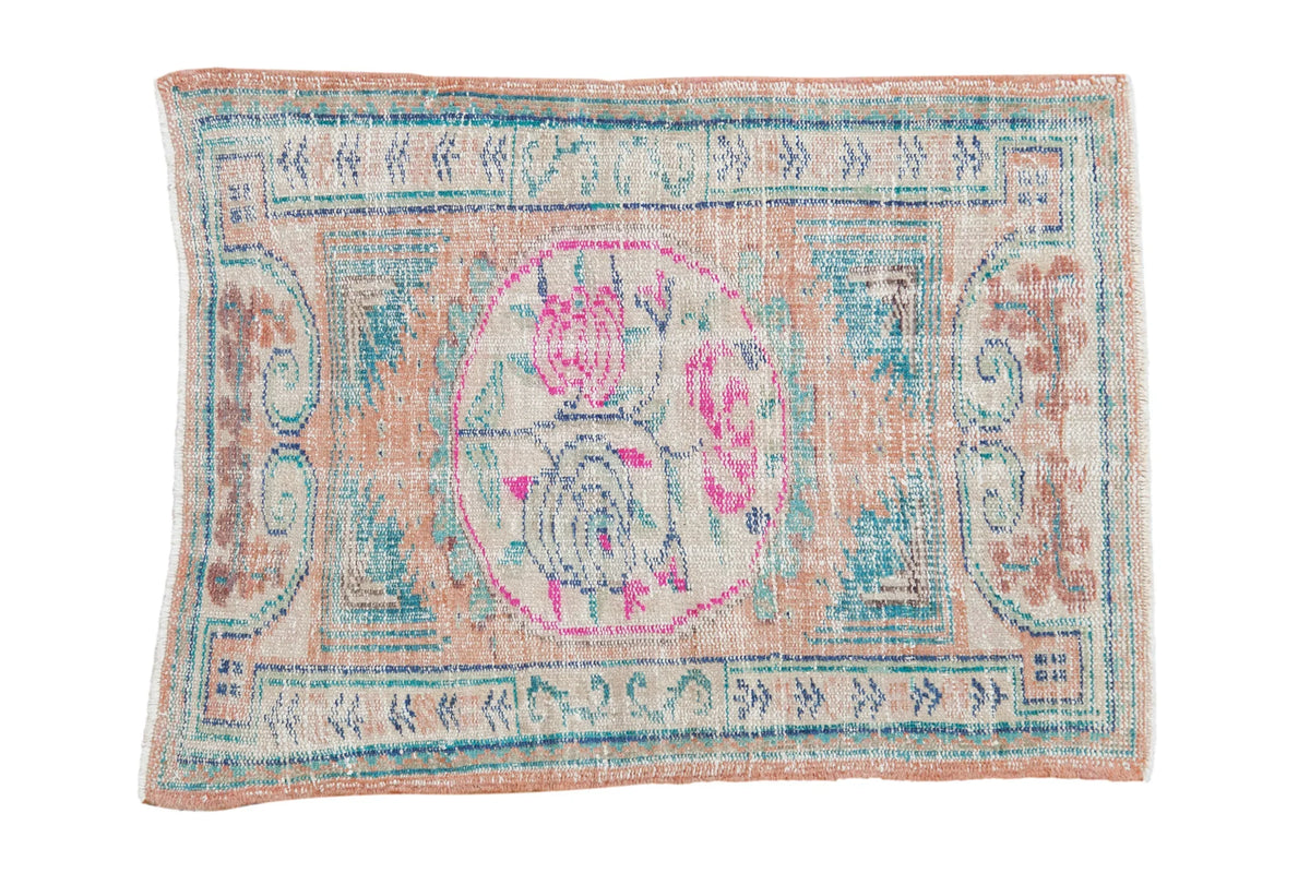 2.5x3.5 Vintage Distressed Oushak Rug showing intricate roundel medallion and geometric border in soft pastel tones.