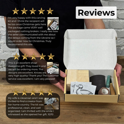 Complete Duck Carving Kit with knife, wooden blocks, sandpaper, sharpening board, pencil, and duck drawing guide