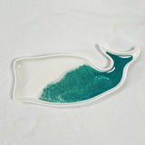 Ceramic whale-shaped tray with hand-poured resin swirls in coastal colors