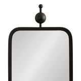 Rectangular mirror with rounded black metal frame topped by a vertical rod ending in a large and small black sphere stacked vertically