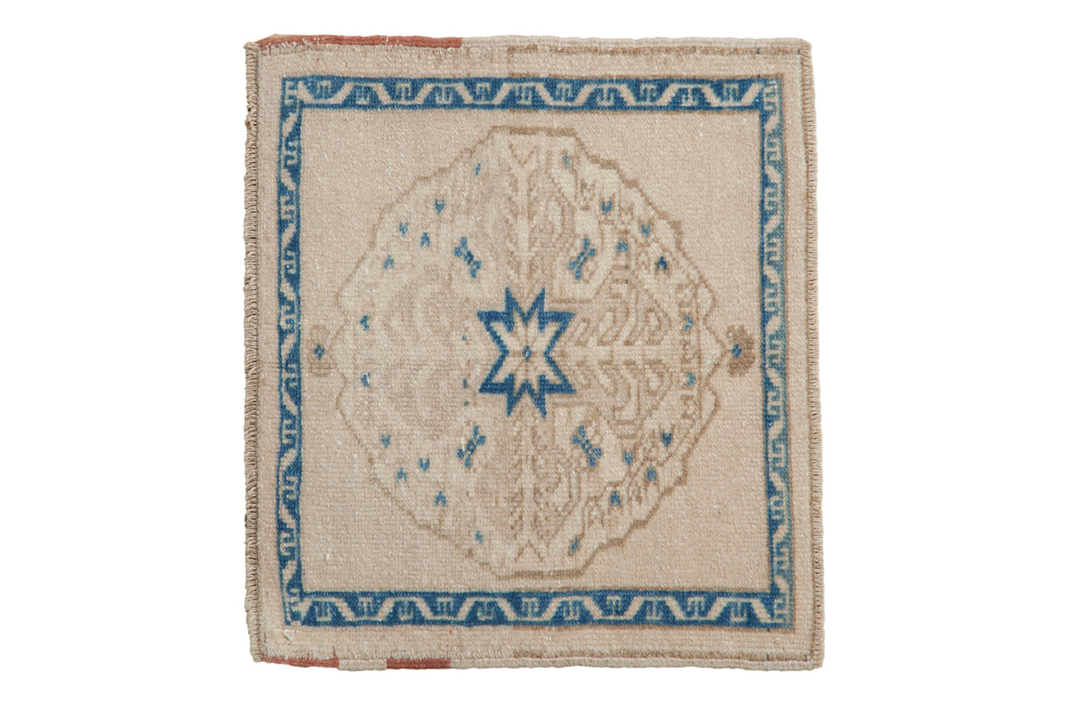 Vintage distressed Oushak square rug mat with starburst medallion and multicolor vine border