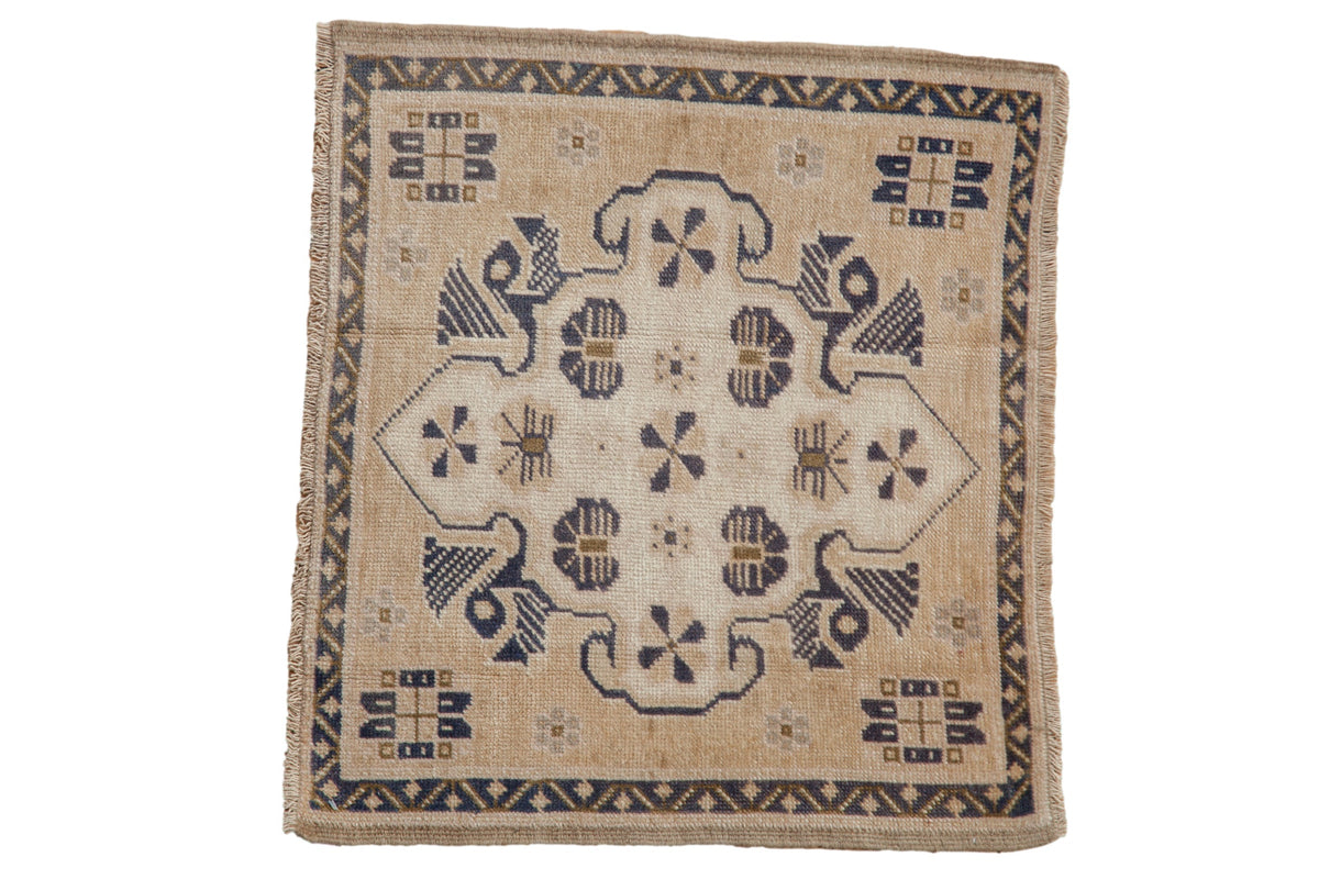 2x2.5 Vintage Distressed Oushak Square Rug Mat showing shield-like oversized center medallion and floral designs in ivory, beige, sand, and navy blue.