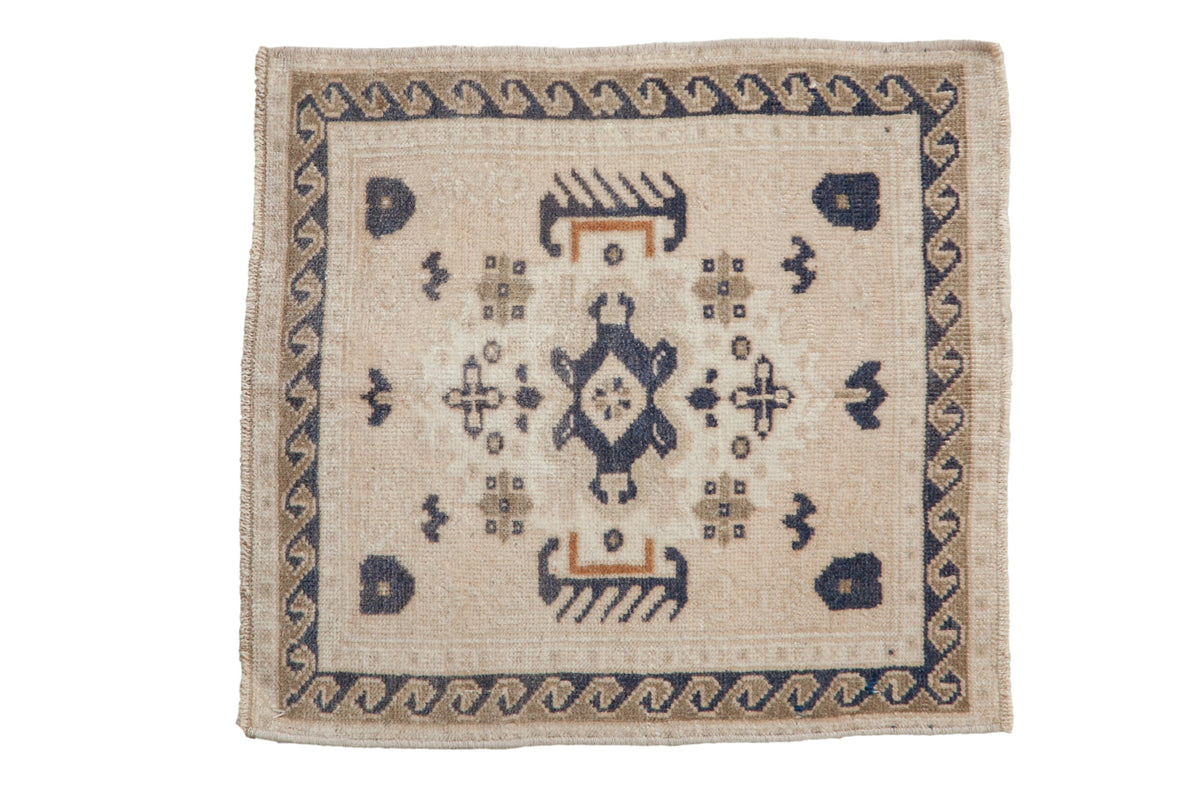 2x2 Vintage Distressed Oushak Square Rug Mat with ivory, dusty navy, and pale copper hues and floral medallion design