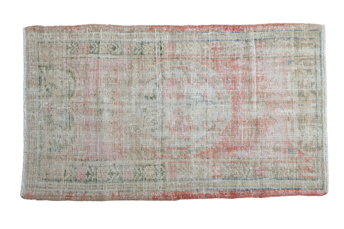 2.5x4 Vintage Distressed Oushak Rug with geometric floral medallion and muted pink and green tones