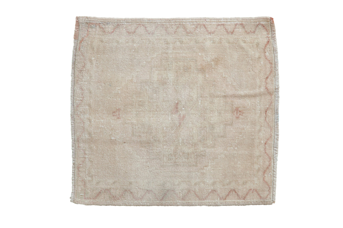 Vintage distressed Oushak square rug mat with ornate medallion and meandering vine border in soft earth tones