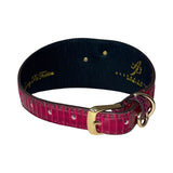 Dark red crocodile-patterned leather dog collar with a gold buckle and D-ring, interior lined with black leather featuring gold branding text.
