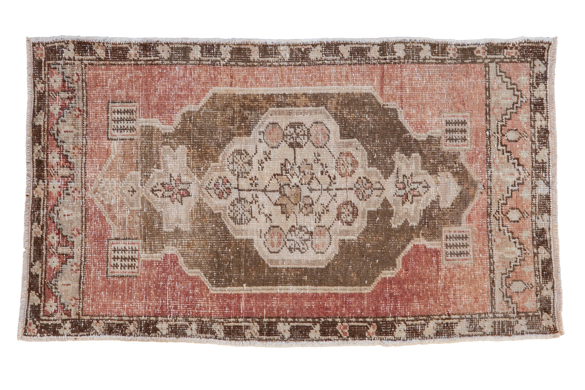 2.5x4 Vintage Distressed Oushak Rug showing center medallion and scalloped contour with faded colors
