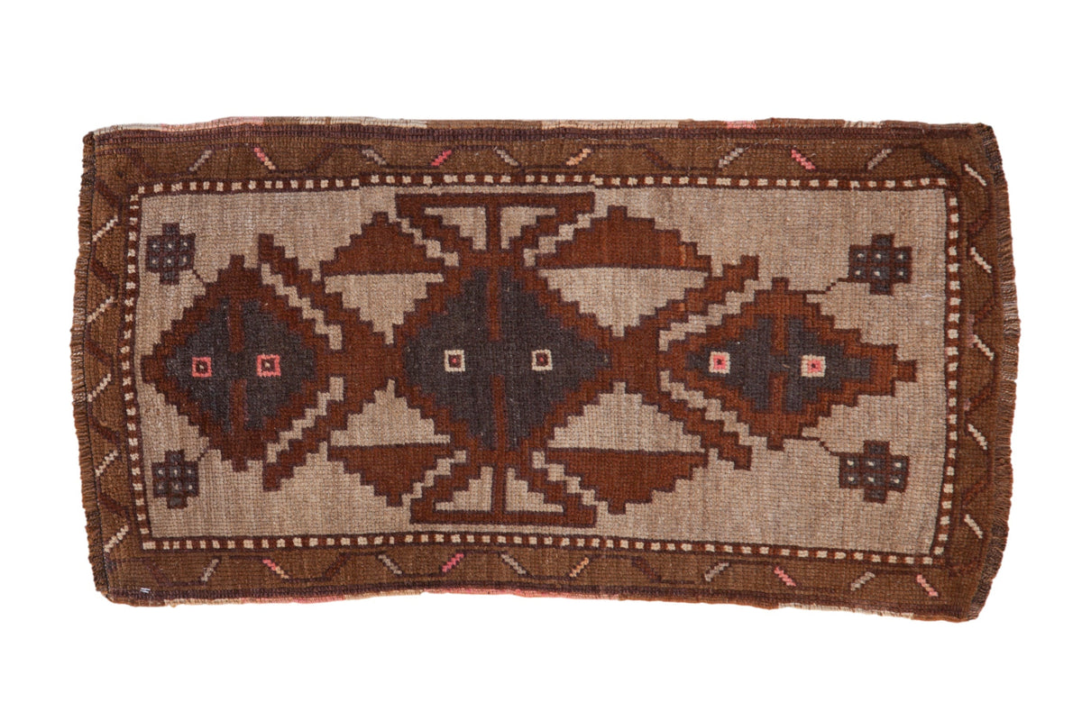 Vintage distressed Kars rug mat runner with geometric blossom medallion and vine leaf border