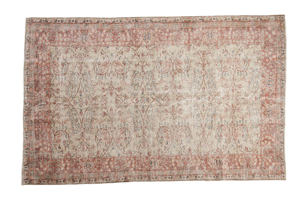 5x8 Vintage Distressed Sparta Carpet with scrolling vines and flower motifs