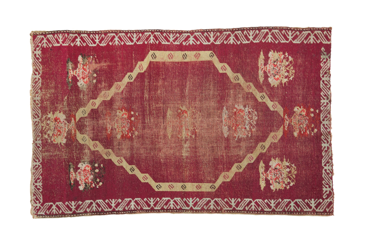 3.5x5.5 Antique Anatolian Rug with large central medallion and floral and serpent motifs in rich reds and neutrals