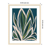 Abstract botanical artwork with layered leaves in shades of green and beige on a deep blue background, framed in light wood with white matting.