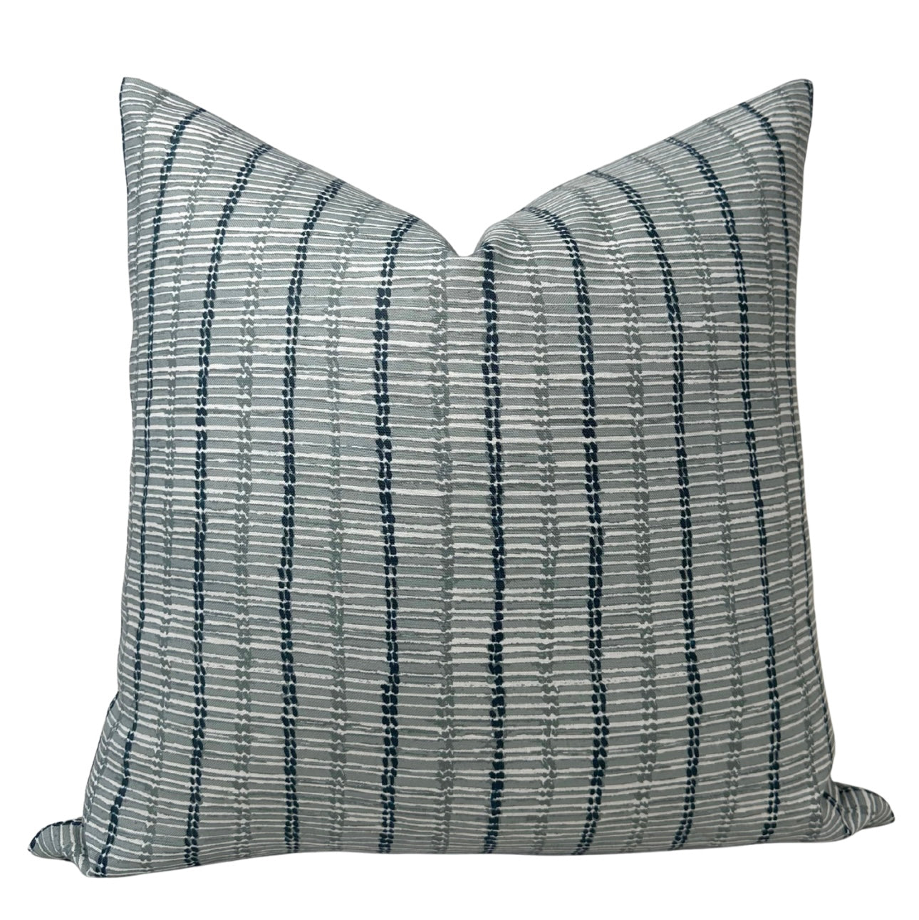 Taza Pillow Cover in Mineral Blue showing front textured fabric and ivory linen back