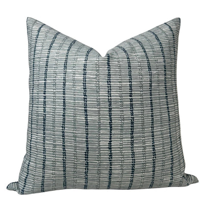 Taza Pillow Cover in Mineral Blue showing front textured fabric and ivory linen back