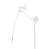 White wall lamp featuring a curved arm with a bulb at the end and a perched sparrow bird detail on top of the arm.