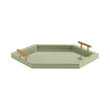 Hexagonal sage green tray with smooth surface and raised edges, featuring two gold-toned cylindrical handles on opposite sides, shown angled on white background.
