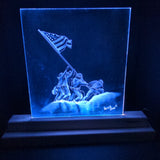 Raise the Flag standard LED light featuring laser-engraved acrylic panel seated in handmade LED light stand illuminating from base