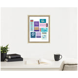 Framed wall art print featuring colorful Pisces-themed matchbook designs with zodiac symbols and ocean motifs, displayed above a white desk with books, plant, and coffee mug.