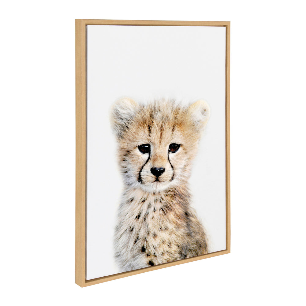 Sylvie Cheetah framed canvas print showing a baby cheetah by Amy Peterson, with a gold frame option