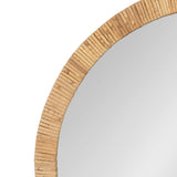 Close-up of a round wall mirror with a light brown segmented wooden frame featuring rectangular pieces arranged in a radial pattern.