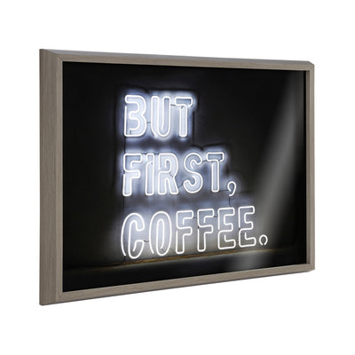 Framed printed glass wall art with neon-style typography reading 'But First Coffee' on a dark background