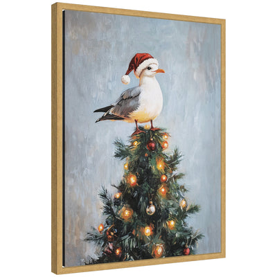Framed canvas art showing a seagull wearing a Santa hat perched on top of a decorated Christmas tree with lights and colorful ornaments