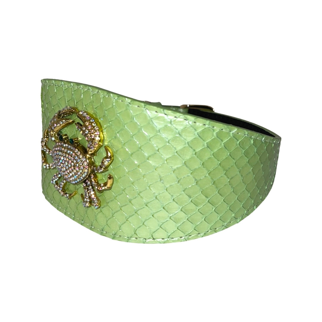 Wide pearl green snake-textured collar featuring a gold rhinestone crab accessory on the front, shown at a slight angle against a white background.