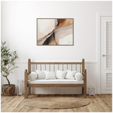 Abstract wall art in beige and brown tones with fluid, earthy shapes above a wooden bench with white cushions in a minimalist room.