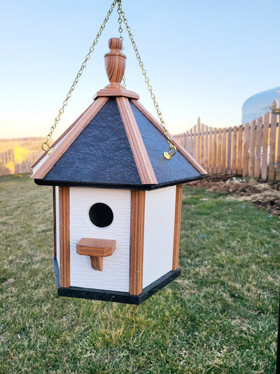 Handcrafted Amish poly birdhouse with one hole, shown mounted outdoors