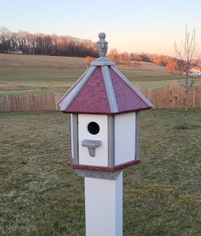 Handcrafted Amish poly birdhouse with one hole, shown mounted outdoors