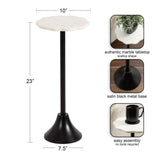 Small side table with 10-inch scalloped white marble top and satin black metal pedestal base measuring 23 inches tall, shown with plant and coffee mug.