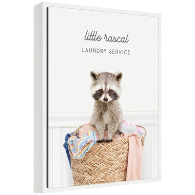 Framed canvas print showing raccoon with laundry, titled Sylvie Raccoon Little Rascal Laundry Service