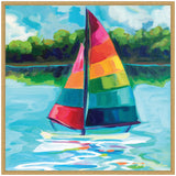 Framed painting of a sailboat with multicolored striped sails floating on calm water, with green trees and a blue sky in the background.