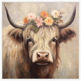 Portrait of a highland cow with long brown and cream fur wearing a crown of soft pink, orange, and cream flowers against a muted background.