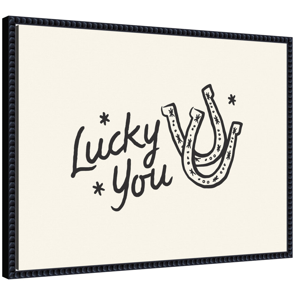 Lucky You Horseshoe hand drawn print by Lucky Guava in black beaded Sylvie frame hanging on wall