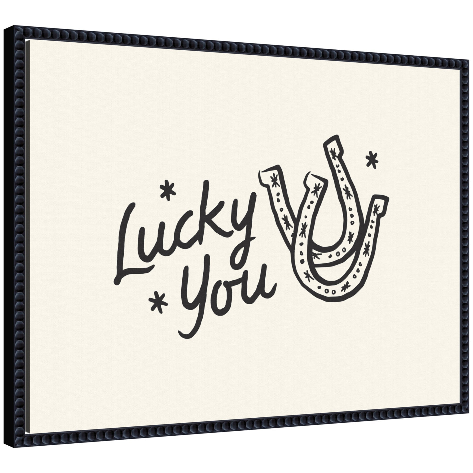 Lucky You Horseshoe hand drawn print by Lucky Guava in black beaded Sylvie frame hanging on wall