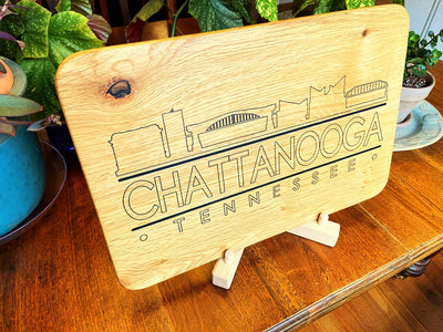 Handmade white oak charcuterie board with engraved Chattanooga skyline