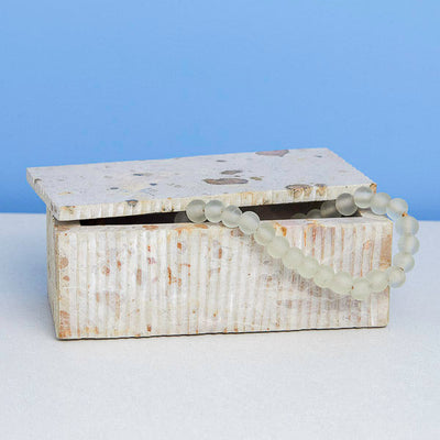 Large Ataca Marble Box in creamy beige with caramel and butterscotch swirls, polished surface.