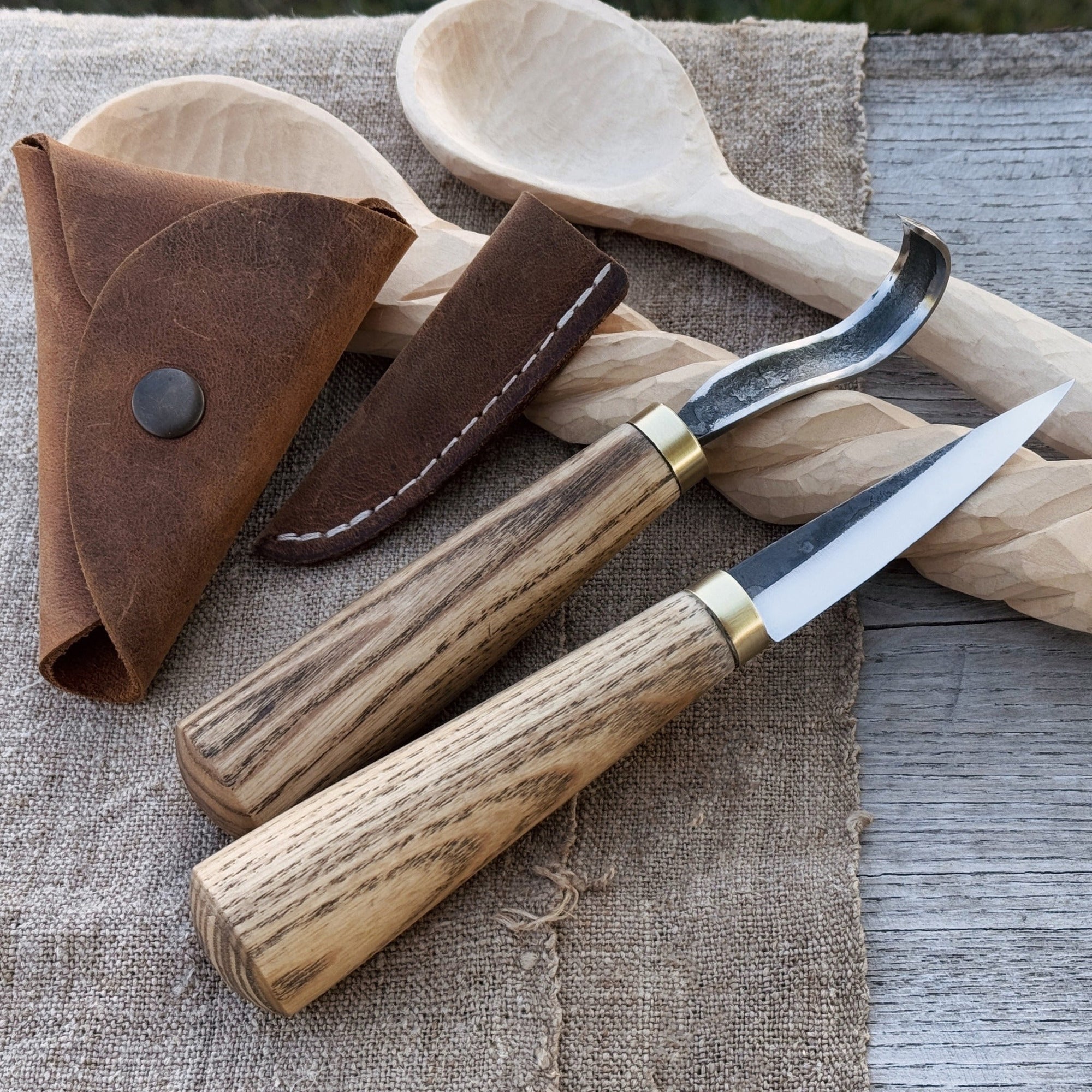 2-piece spoon carving knife set with leather sheaths by Sharky Forged Steel Tools