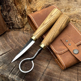 2-piece spoon carving tool set with leather case, featuring hand-forged carbon steel blades and ash wood handles