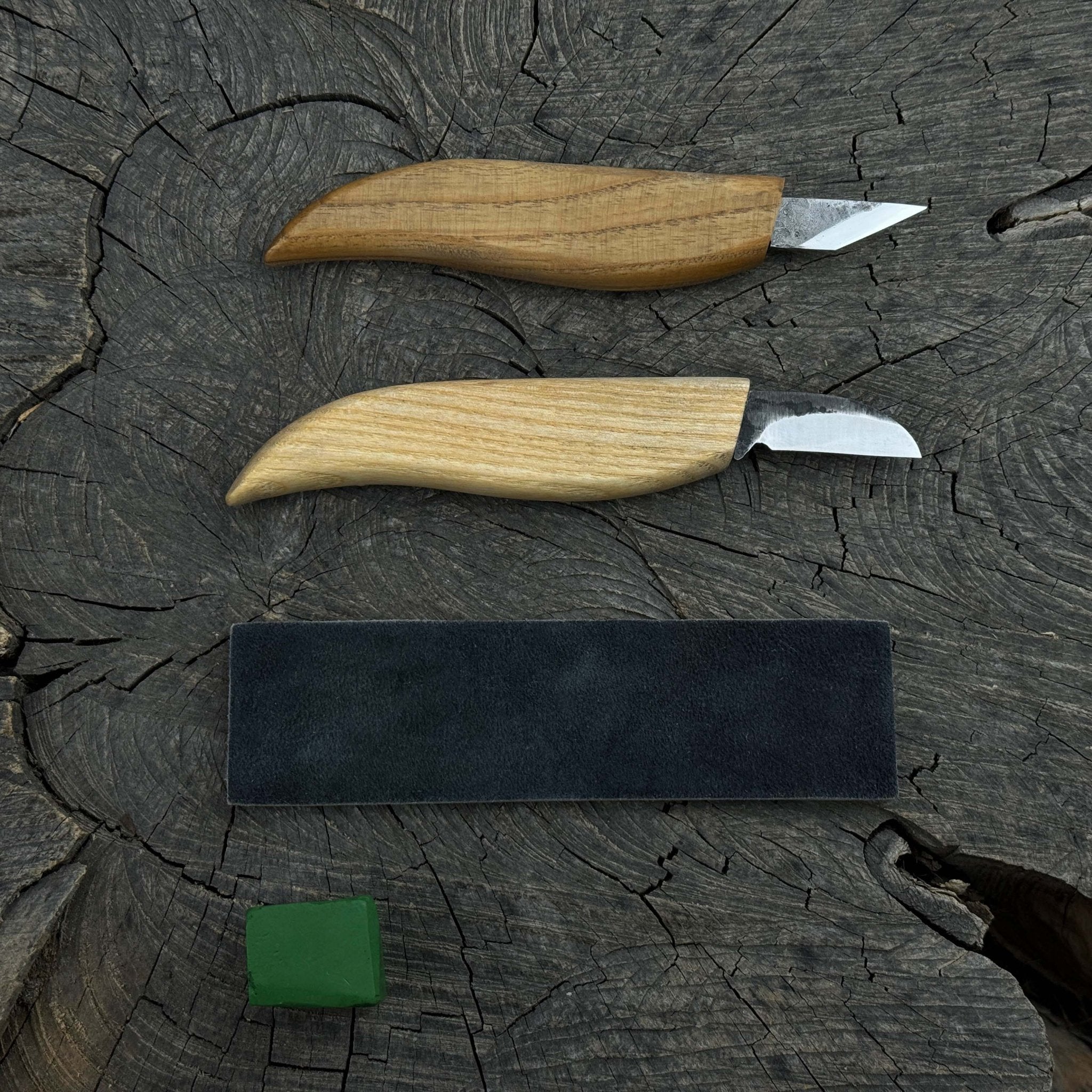 2-piece wood carving knife set with leather strop by Sharky Forged Steel Tools showing ash wood handles and high-carbon steel blades