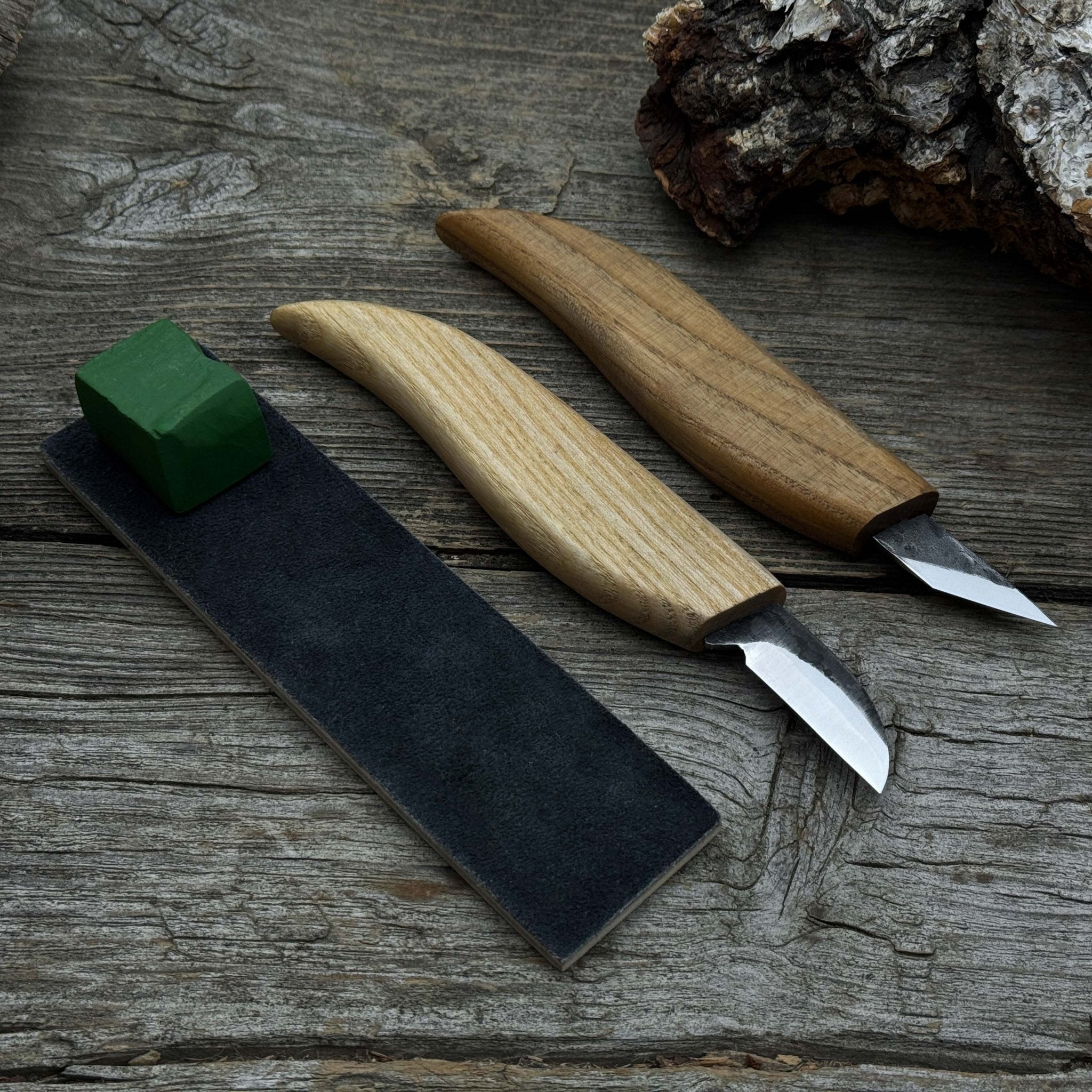 2-piece wood carving knife set with leather strop by Sharky Forged Steel Tools showing ash wood handles and high-carbon steel blades