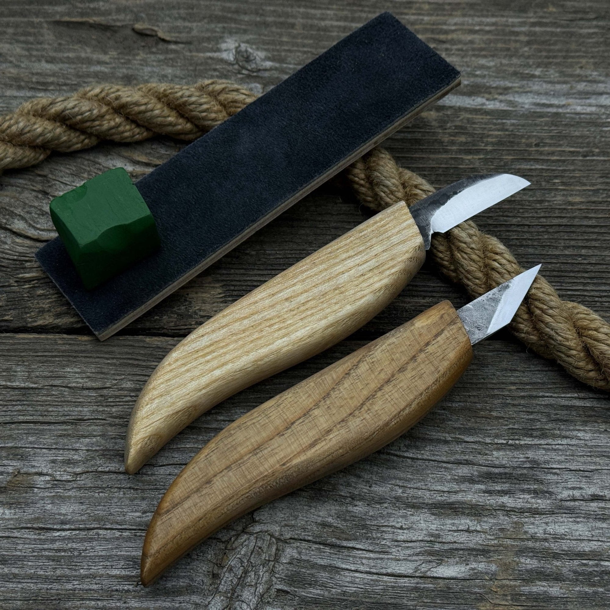 2-piece wood carving knife set with leather strop by Sharky Forged Steel Tools showing ash wood handles and high-carbon steel blades