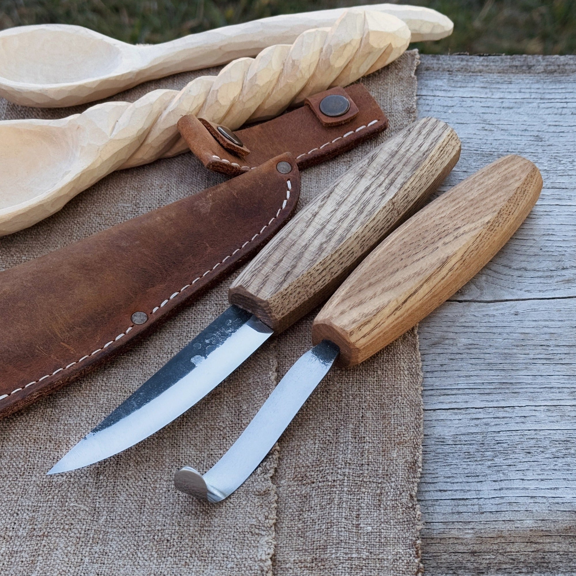 2-piece wooden spoon carving set with hook knife, sloyd knife, and leather sheath
