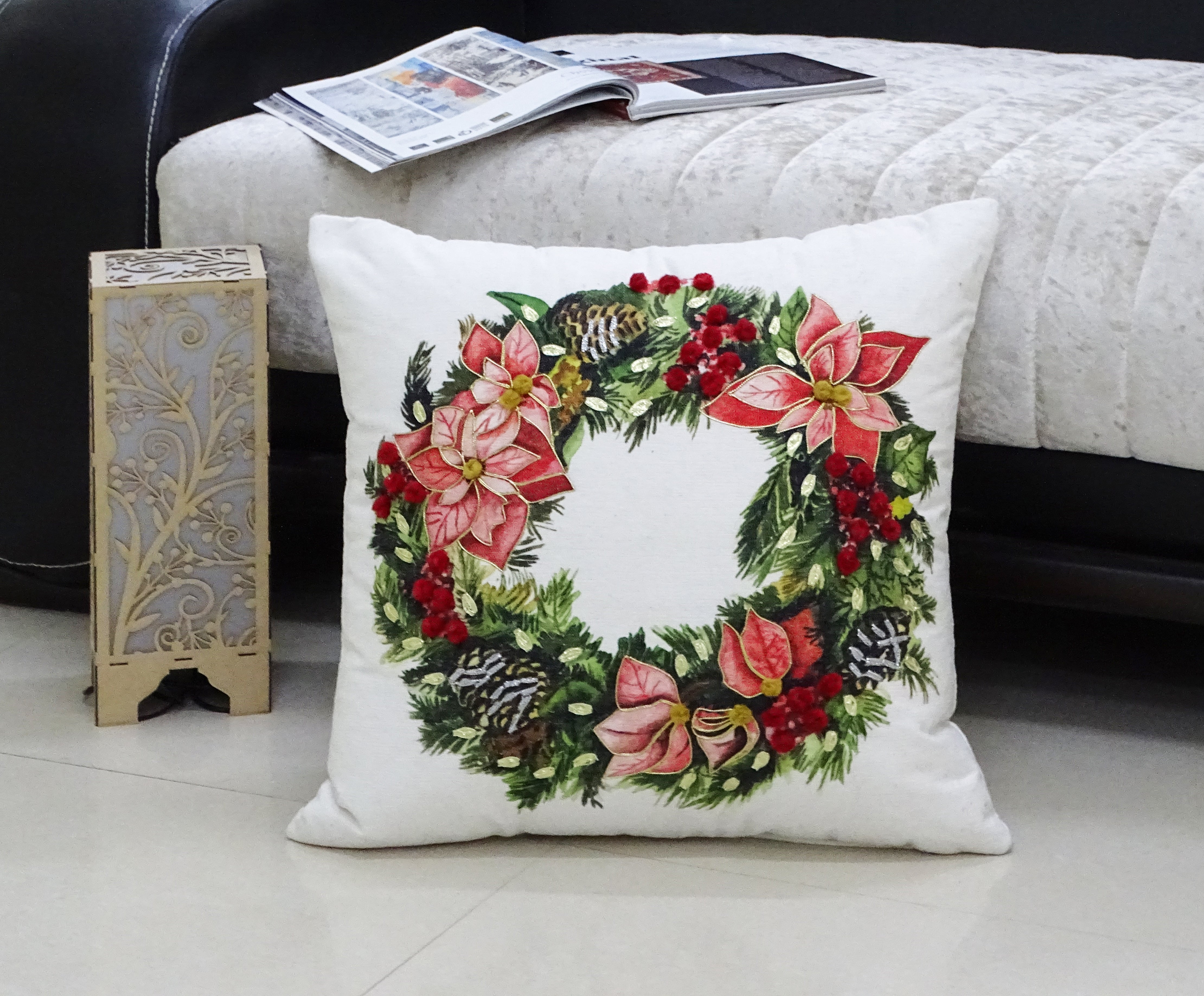 Vibhsa Christmas Wreath Decorative Throw Pillow with green wreath embroidery and whip stitch flange detail