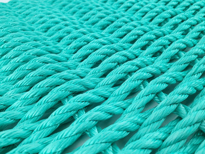 Handmade solid color rope door mat in various colors and sizes