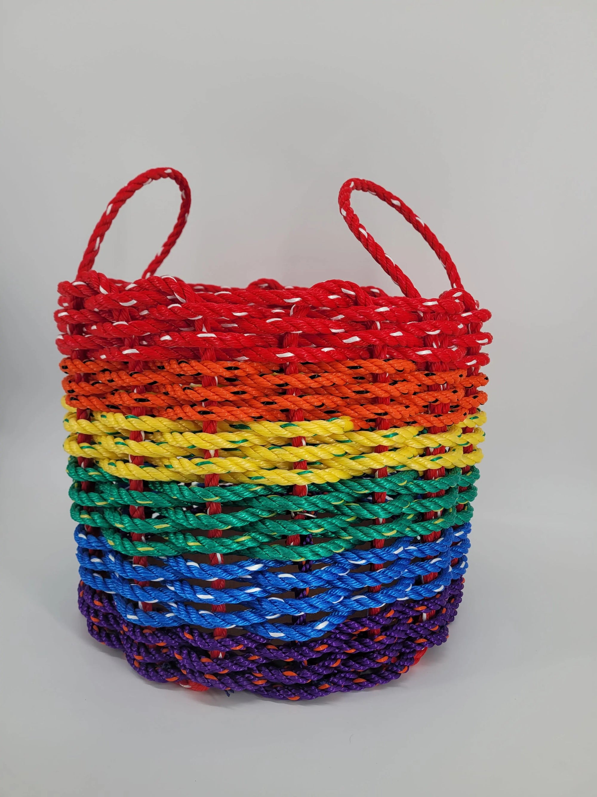 Colorful handmade storage basket woven from authentic Maine lobster rope