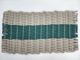 Tan and hunter green handmade lobster rope mat made from lobster trap rope