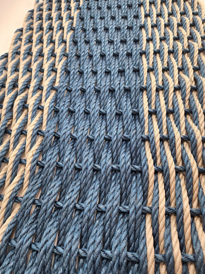 Large navy blue and tan lobster rope mat with double basket weave