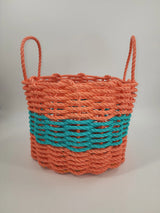 Handmade lobster rope storage basket in coral orange and teal colors