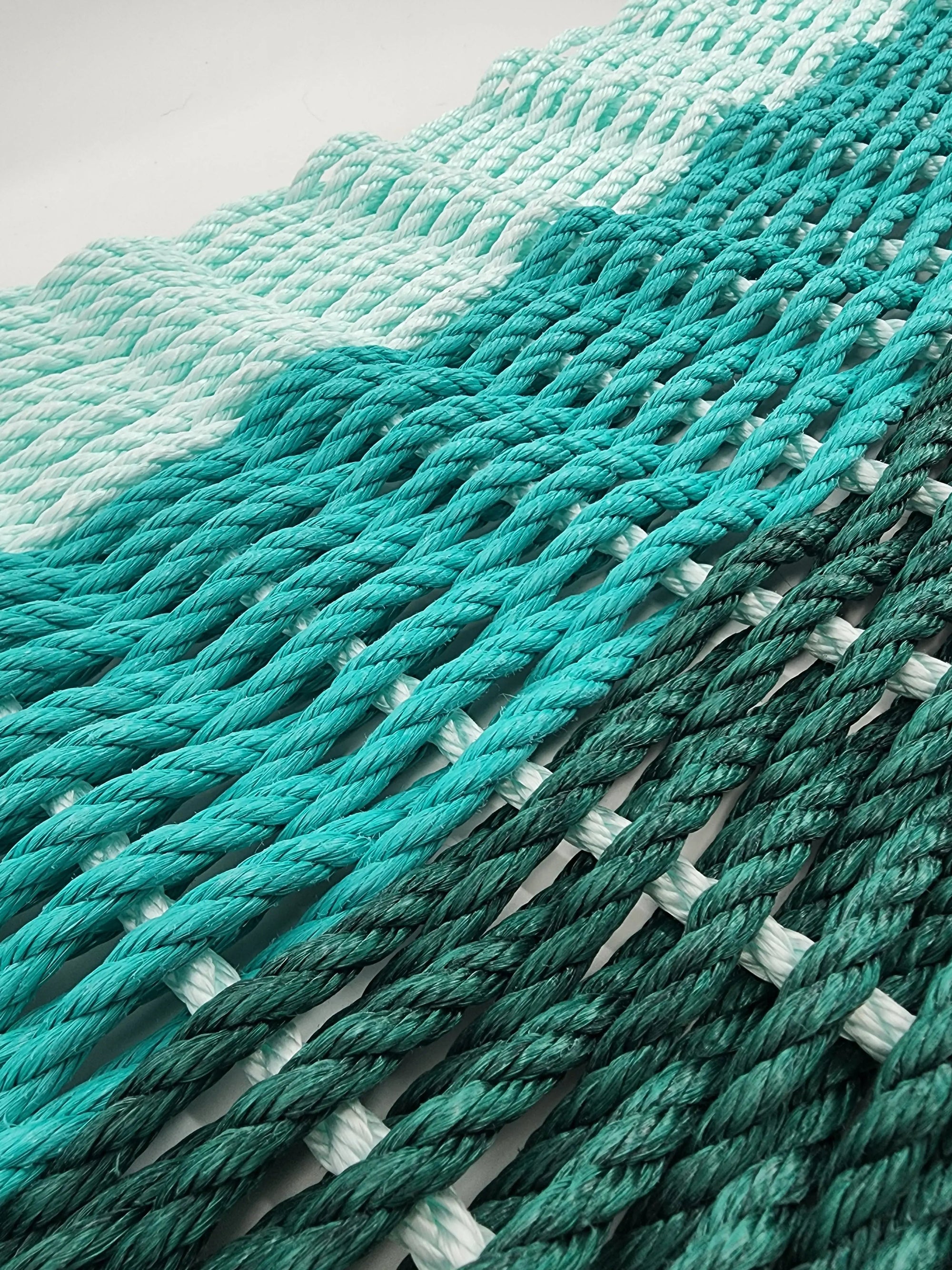 Handmade Ombre Rope Mat in Hunter Green, Teal, and Seafoam colors
